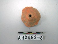 藏品(紅色素面陶紡輪)的圖片